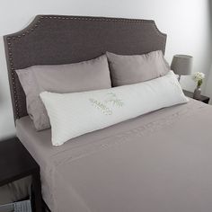 Enjoy a rejuvenating sleep and luxurious comfort with the unique benefits of charcoal in this Portsmouth Home memory foam body pillow. In white. Click this BED & BATH GUIDE to find the perfect fit and more!FEATURES14" x 50" x 7.5"Supersoft fiber pillowcaseCharcoal-infused solid & shredded memory foamStays cool & comfortable while shaping to your body for full supportNaturally absorbs moisture & odorsAntibacterial, mildew-proof & breathableCONSTRUCTION & CARECover: 40% rayon from bamboo, 60% poly Benefits Of Charcoal, Memory Foam Body Pillow, Bamboo Charcoal, Body Pillow, Portsmouth, Bed Bath, Memory Foam, Bed Pillows, Age Group