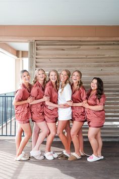 a group of women standing next to each other