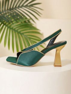 Elevate your style with our Sexy Roman Style Stiletto Heels. Featuring a sleek design and a comfortable fit, these heels will add a touch of sophistication to any summer outfit. The unique Roman style adds a touch of elegance, perfect for any occasion. Step into summer with confidence in these stunning Stiletto Heels. Color : Dark Green Heel Height : High Heel Upper Material : Satin Lining Material : PU Leather Insole Material : PU Leather Outsole Material : Rubber Fitted Summer Evening Heels, Green High Heel Slingback Pumps For Party, Elegant Green Slingback Pumps For Party, Fitted High Heel Slingback Pumps For Summer, Green High Heel Slingback Pumps For Summer, Green Block Heel Slingback Pumps For Summer, Summer Party Slingback Pumps With Padded Heel, Green Slingback Pumps With Sculpted Heel For Party, Green Slingback Pumps With Sculpted Heel For Summer