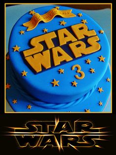 a star wars birthday cake with gold stars on it and the words,'star wars 3'in blue frosting