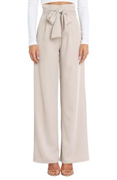 Wide legs punctuate these tailored pants designed with a drapey tie belt and crisp pleats. Zip fly with hook-and-bar closure Ties at waist Side pockets Lined 100% polyester Hand wash, dry flat Imported Drapey Pants, Tie Pants, Elegant Pant, Chic Pants, Utility Pants, Pants Design, Suit Separates, Tailored Pants, Wide Legs