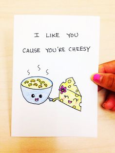 someone is holding up a card that says i like you cause you're cheesy