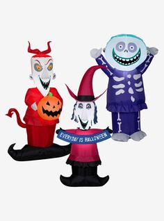 three inflatable halloween characters are standing next to each other