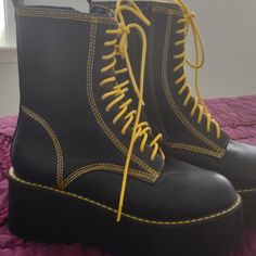 Black And Yellow Boots Size 6 Never Worn Spring Chunky Platform Combat Boots In Black, Spring Black Combat Boots With Chunky Platform, Yellow Synthetic Boots With Round Toe, Yellow Round Toe Synthetic Boots, Yellow Leather Platform Boots With Round Toe, Yellow Synthetic Round Toe Boots, Yellow Lace-up Platform Boots, Yellow Platform Ankle-high Boots, Yellow Platform Lace-up Boots