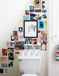 a magazine page with pictures on the wall and toilet paper dispenser next to it