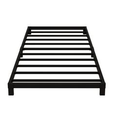 a black bed frame with no sheets on it