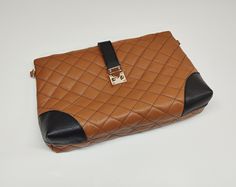 An elegant classic style bag with a legendary design that marks deeply the modern fashion, made of excellent quality genuine greek grained calf leather (calfskin). The bag's inner space includes 1 zipped pocket and 2 additional pockets on the other side.  Dimensions: Height 14 cm x Length 20 cm x Width 6 cm (5.5 x 7.9 x 2.4 inches). The bag can be used as a top handle bag or envelope bag. The total chain's length is about 130 cm (51.18 inches). We may apply any preferable length for the chain also, according to your demands. The female model that has been used for the measurements is 1.67 m tall (65.7 Inches). The bag arrives with a special fabric case also, as a cover for it and a small token of appreciation for selecting ''Virsa Bags''. Please expect your package delivered early: You may Business Satchel Bag With Fold Over Clasp, Business Satchel With Fold Over Clasp, Rectangular Shoulder Bag With Fold Over Clasp For Business, Office Shoulder Bag With Fold Over Clasp, Brown Envelope Bag For Business, Elegant Envelope Satchel For Daily Use, Luxury Brown Satchel Clutch, Elegant Envelope Travel Bag, Leather Envelope Bag With Detachable Strap