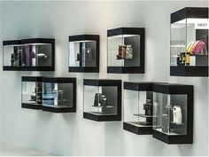 a display case filled with lots of different types of items in glass cases next to each other