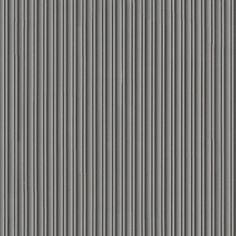 a gray wall with vertical lines on it