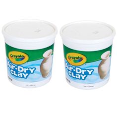 two buckets of air dry clay sitting next to each other on a white background