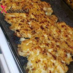 some food that is on top of a pan in the oven and ready to be cooked