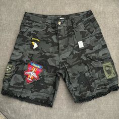 Novamen - Patch Me Paint Splatter Camo Shorts. Size 34 Waist, Color Black And Grey Camo Print. Airborne Patches On Front And Back Of Shorts. Casual Ripped Camouflage Bottoms, Black Men Outfits Street Style, Long Jean Shorts, Fishing Shorts, Cute Clothing Stores, North Face Shorts, Everyday Casual Outfits, Tan Pants, Grey Camo