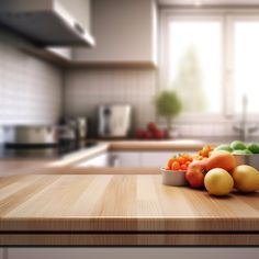 a wooden counter top topped with bowls filled with fruits and veggie's