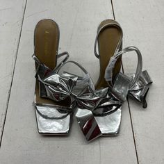 Lemonade Silver Beau Bow Heels Women's Size 9 New New Condition See All Pics Ls304/23shoesb26kh1 Chic Metallic Heels With Wrapped Heel, Metallic Heels With Wrapped Block Heel, Metallic Block Heels With Wrapped Heel, Chic Metallic Heels With Heel Loop, Silver Heels With Wrapped Heel And Round Toe, Spring Metallic Sandals With Wrapped Heel, Metallic Sandals With Padded Heel And Pointed Toe, Spring Metallic Heels With 4-inch Heel, Silver Synthetic Heels With Sculpted Heel