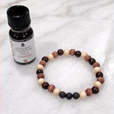 Boutique & Handmade Pursonic Aromatherapy Essential Oils Mandarin 10ml Handmade Lava Stone And Wooden Bead Bracelet. Place A Few Drops Of Essential Oil On The Lava Stone Beads To Wear. These Items Are New And Have Never Been Worn Or Used. Smoke Free Studio Same Day Shipping Get Free Shipping On All Bundles Of 3 Or More Items When You Mention Back To School On Your Bundle. Bundle, And Get A Shipping Discount Sold Over 400+ Listings Top-Rated 5 Star Seller! Posh Ambassador Ii Posh Mentor If You Ha Diffuser Essential Oils, Wooden Bead Bracelet, Stone Diffuser, Aromatherapy Essential Oils, Diffuser Bracelets, Jewelry Essentials, Lava Bead, Lava Stone, Essential Oils Aromatherapy