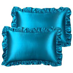 two blue pillows with ruffles on the edges and one pillow has been made from satin