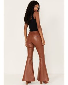 Model is 5' " wearing a size 26. Rust copper pleather fabrication. Zip-fly with button closure. Flare leg. Finished hem. Two back pockets. High Rise Flare Jeans, Denim Details, Rock Roll, Denim Women, Flare Jeans, Rock And Roll, Shirt Shop, Womens Boots, Shopping Outfit