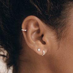 A perfect tiny silver hoop earring with a hinge construction. Our Mini Hoop Earring is sold as a single piece and is great for second piercings.

This hoop is also available in 14k gold.

Thickness: 1.5mm | Inner diameter: 6mm | Outer diameter: 9mm Second Piercings, Silver Hoop Earring, Huggie Earrings Silver, Earring Silver, Silver Ear Cuff, Mini Hoop Earrings, Sustainable Jewelry, Traditional Jewelry, Recycled Sterling Silver