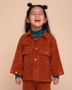 Cool, cute and adventure ready! Indoors or outdoors. At a playdate or at a holiday dinner. Our cozy and flexible warm brown corduroy shacket was made to be the perfect layer any season! "Pick one of our iron-on patches to go with this jacket at no extra cost!" ✨PRODUCT DETAILS✨ 98% Peruvian cotton, 2% LYCRA® Reactive dye for vivid long-lasting colors and minimum environmental impact. 🌱 Fit & Style Two chest pockets and two side pockets. 😎 Made in Peru Made in a small family-owned workshop in Peru committed to reducing textile waste. Match with our corduroy Trousers for the full look!! 🧡 🙌 Brown Long Sleeve Utility Jacket For Outdoor Activities, Adventure Utility Jacket With Pockets, Adventure Long Sleeve Utility Jacket With Pockets, Casual Corduroy Outerwear For Outdoor, Casual Corduroy Outdoor Outerwear, Long Sleeve Adventure Outerwear With Pockets, Long Sleeve Outerwear With Pockets For Adventure, Adventure Long Sleeve Outerwear With Pockets, Winter Utility Jacket With Long Sleeves For Adventure