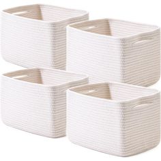 three white storage baskets with handles