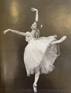 an old photo of a ballerina in white dress