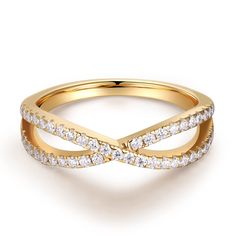 a yellow gold ring with white diamonds on the band and a twist design in the middle