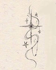 a drawing of an anchor and stars on paper