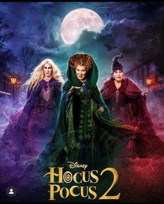 two women in costumes standing next to each other on a poster for hocus pocus 2