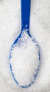 some muscle soak recipe on a spoon in the snow with text overlay that reads, some muscle soak recipe