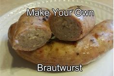 three sausages on a white plate with the words make your own brautrst