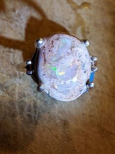 Very pretty Mexican cantera fire opal of 4 cts sits up high in this silver size 6.5 sterling ring Silver Ethiopian Opal Ring With Cabochon, Unique Collectible Opal Ring, Collectible Unique Opal Ring, Collectible Opal Ring, Mexican Fire Opal Ring, Fire Opal Ring, Opal Engagement, Gold Name Necklace, Engagement Rings Opal