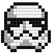 a black and white image of a face made out of lego blocks