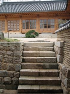 stone steps lead up to a building