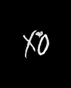 xo written in chalk on a black background