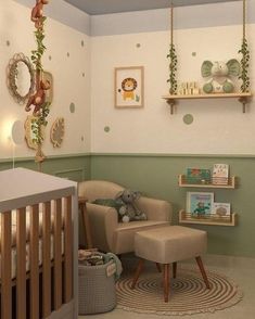 a baby's room decorated in green and white