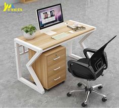 an office desk with a chair and computer monitor on the top, next to it