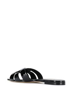 Ah, these are the kind of sandals that make you feel effortlessly chic while casually strutting through the streets of your favorite city. The Saint Laurent Tribute Sandals bring a touch of elegance to any outfit, making them a versatile staple in your wardrobe. Perfect for those days when you want to feel both stylish and comfortable, these sandals are your go-to choice. Color: Black Season: FW24 Made in: Italy Composition: Sole: Leather 100%, Outer: Leather 100%, Lining: Leather 100% Saint Laurent Sandals, Saint Laurent Women, Leather Sandals Flat, Leather Cap, Scarf Jewelry, Sandals Black, Sunglasses Sale, 4 In 1, Leather Flats