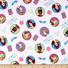 a white fabric with princesses on it