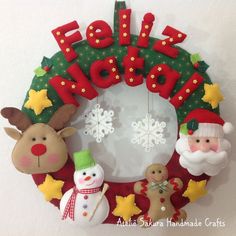 a christmas wreath hanging on the side of a wall