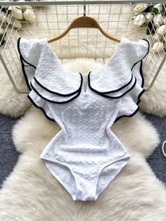 White Ruffled Textured One-Piece Swimsuit for Women Elegant Stretch Swimwear With Ruffles, Elegant Ruffled Stretch Swimwear, Summer Poolside Bodysuit With Ruffles, Summer Ruffled Bodysuit For Poolside, Stretch Ruffles Bodysuit For Beach Season, Stretch Bodysuit With Ruffles For Beach Season, Ruffled Bodysuit For Summer Beachwear, Summer Bodysuit With Ruffles And Stretch, White Summer One Piece With Ruffles