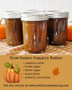 three jars filled with pumpkin butter sitting on top of a checkered table cloth next to an