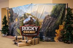 there is a backdrop for the rocky railway exhibit