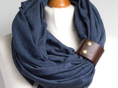 "Lightweight cotton infinity scarf with leather strap. * Tube scarf made of light weight cotton jersey fabric; fabric is high quality and certified, eco friendly * Soft loop scarf, scarf is wraped twice around neck, loose and stylish * Scarf is embellished with a brown leather cuff/bracelet * This clasp can be worn separately as a bracelet, making a funky bracelet * Ready for shipping * Measures: 59'' (150cm) inches around and 39\" (100cm) inches wide * Open seams, naturally rolling; hand finish Scarf Cuff, Coral Scarf, Travel Scarf, Fabric Brooch, Tube Scarf, Stylish Scarves, Cotton Jersey Fabric, Scarf For Women, Loop Scarf