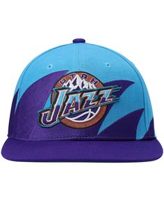 Mitchell & Ness' Hardwood Classics Sharktooth hat pairs Utah Jazz nostalgia with a bold design to bring you the ultimate fan accessory. The adjustable closure, flat bill and high crown bring together the classic snapback look. The '90s-inspired design and detailed embroidery leave no doubt that the Utah Jazz are your team. Retro Blue Snapback Hat For Sports Events, Retro Blue Hat For Sports Events, Retro Blue Adjustable Snapback Hat, Blue Retro Adjustable Snapback Hat, Blue Retro Adjustable Hats, Retro Adjustable Blue Hats, Adjustable Retro Blue Hats, Detailed Embroidery, Fan Accessories