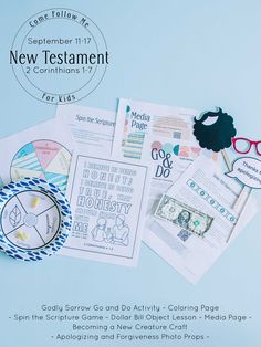 some paper and scissors are laying on top of each other with the words new testament