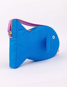 Find a new friend in this super plushy Fish Purse! This bag is so comfy and soft to wear, you'll be making it your daily driver. The inside is super roomy and can fit everything you need. Store small items in the two inside pockets. The grommet eye is the perfect size to thread your phone charger through to keep your phone charged and on hand! Hang your keys or our matching Fish Keychains off the double zipper pulls or the paracord loops on the head & tail of the bag. Adjust the strap to your pe Playful Blue Bag With Adjustable Strap, Playful Crossbody Shoulder Bag For Travel, Playful Satchel Shoulder Bag With Adjustable Strap, Playful Everyday Standard Backpack, Playful Pouch Shoulder Bag For Everyday Use, Playful Blue Shoulder Bag For Travel, Playful Shoulder Bag With Adjustable Strap, Playful Everyday Bag With Removable Pouch, Playful Shoulder Bag With Removable Pouch