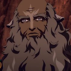 an animated image of a man with long gray hair and beard wearing a horned headdress