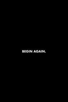 a black background with the words begin again