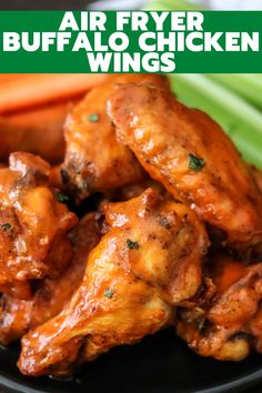 air fryer buffalo chicken wings on a plate with carrots and celery