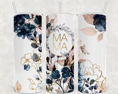 three white and blue floral canisters with the word ma in gold on them